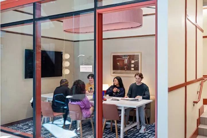 group of young adults studying