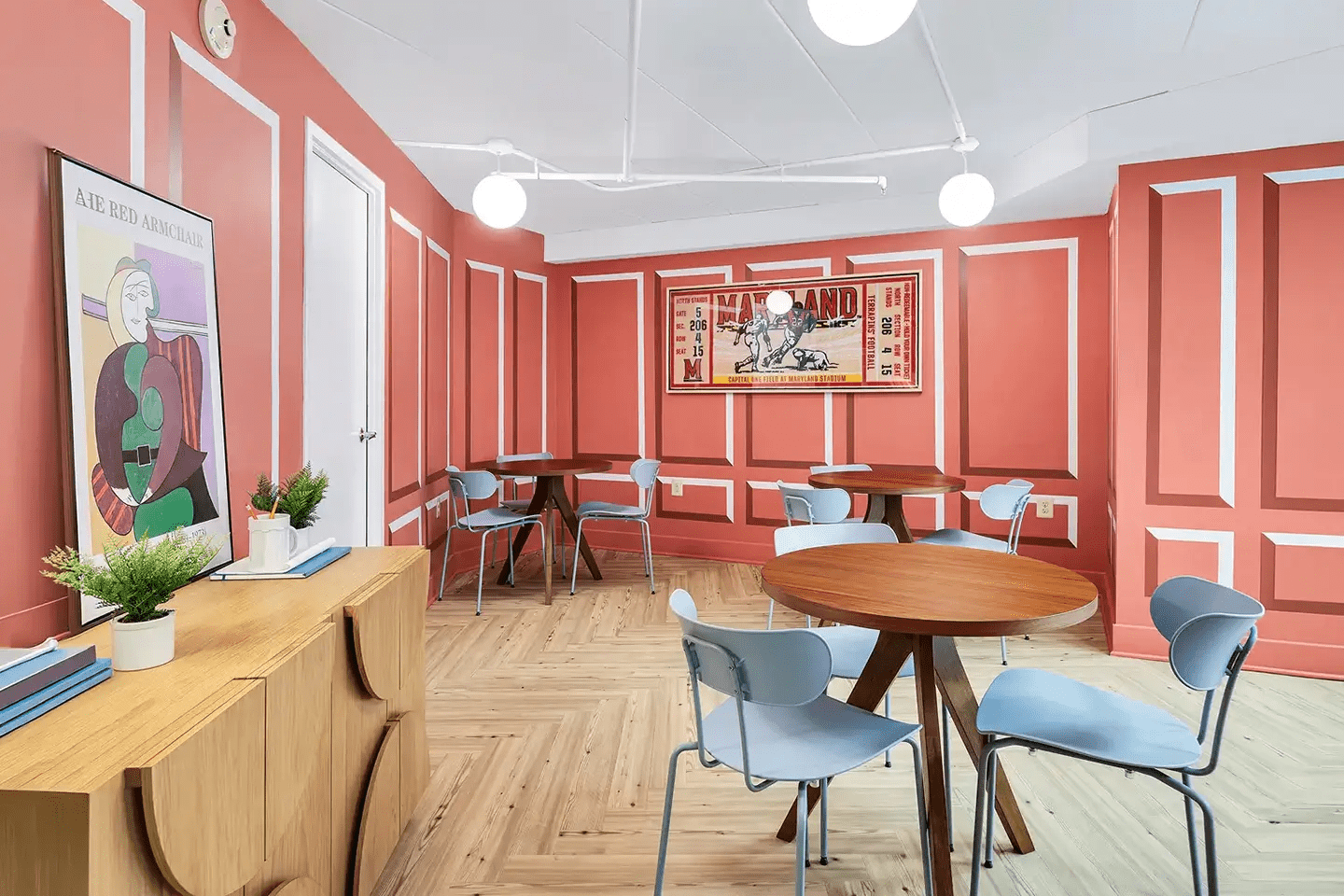 Student apartment study space with tables and chairs